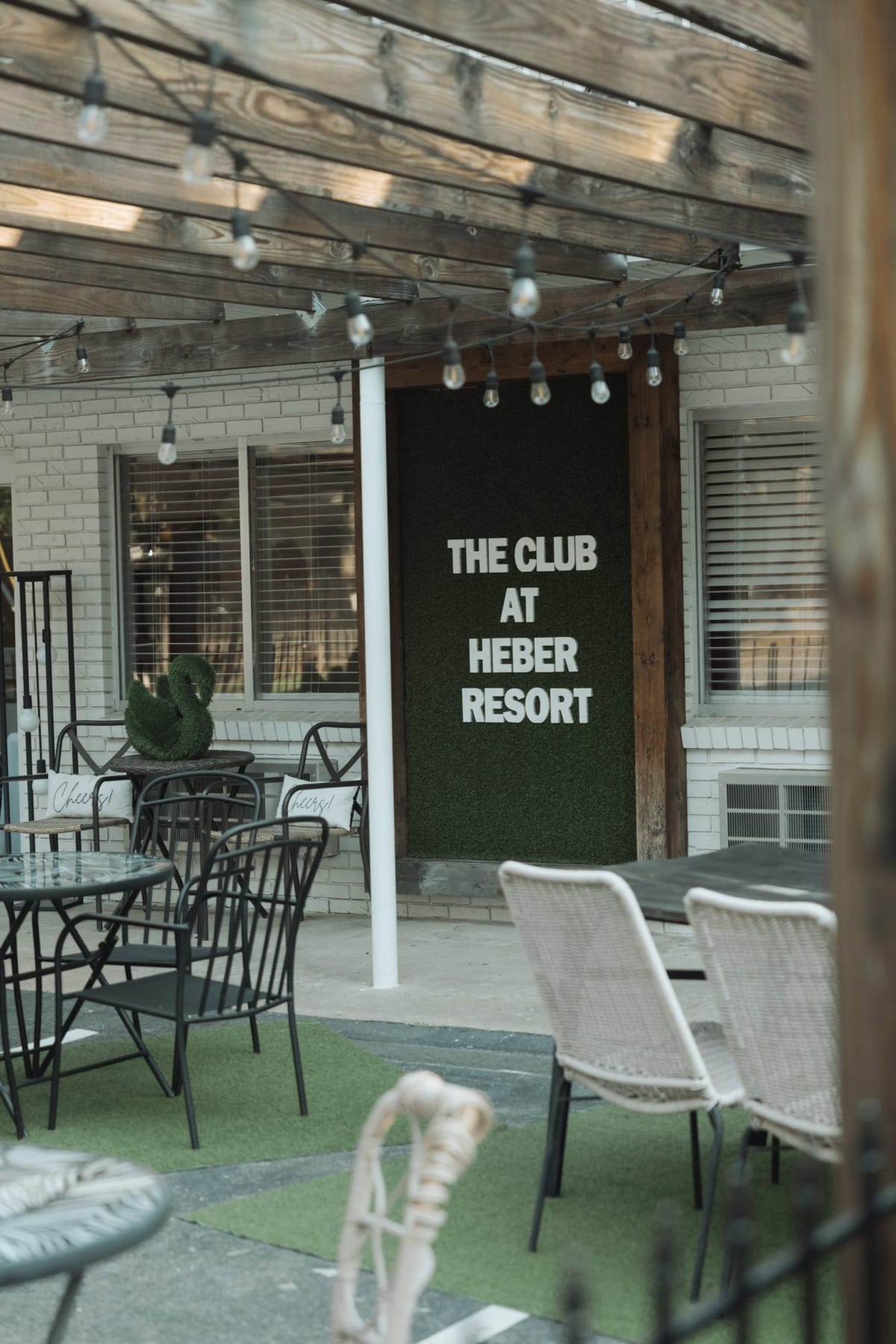 The Club at Heber Resort patio with string lights